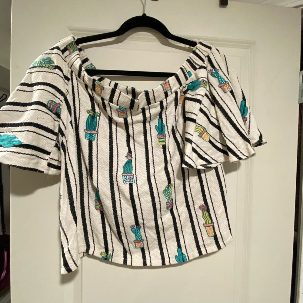Judith March Off-the-shoulder top.